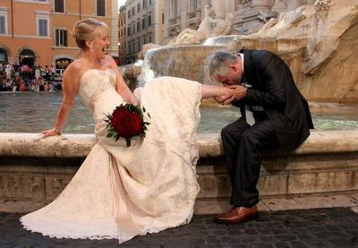 Our wedding day, taken at the Trevi Fountain, Rome, Italy.